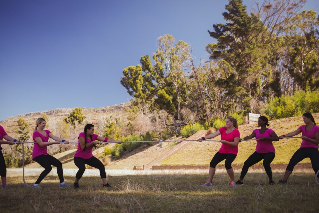 group of women playing tug of war during obstacle 2026 01 09 08 35 45 utc