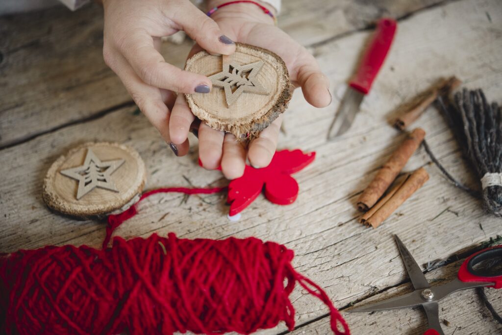 hands crafting homemade decorations from natural m 2026 01 09 11 38 36 utc