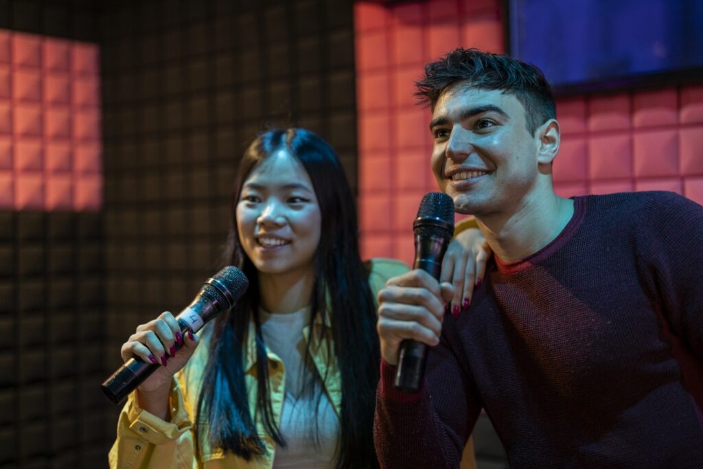 smiling friends singing karaoke together 2026 01 08 05 40 15 utc